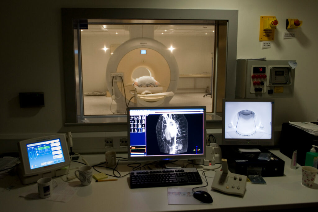Image showing scanner and associated screens and tech
